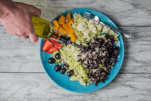 Olive oil drizzled on a keto friendly meal